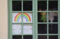 A rainbow picture in a window during the coronavirus / COVID-19 pandemic May 2020